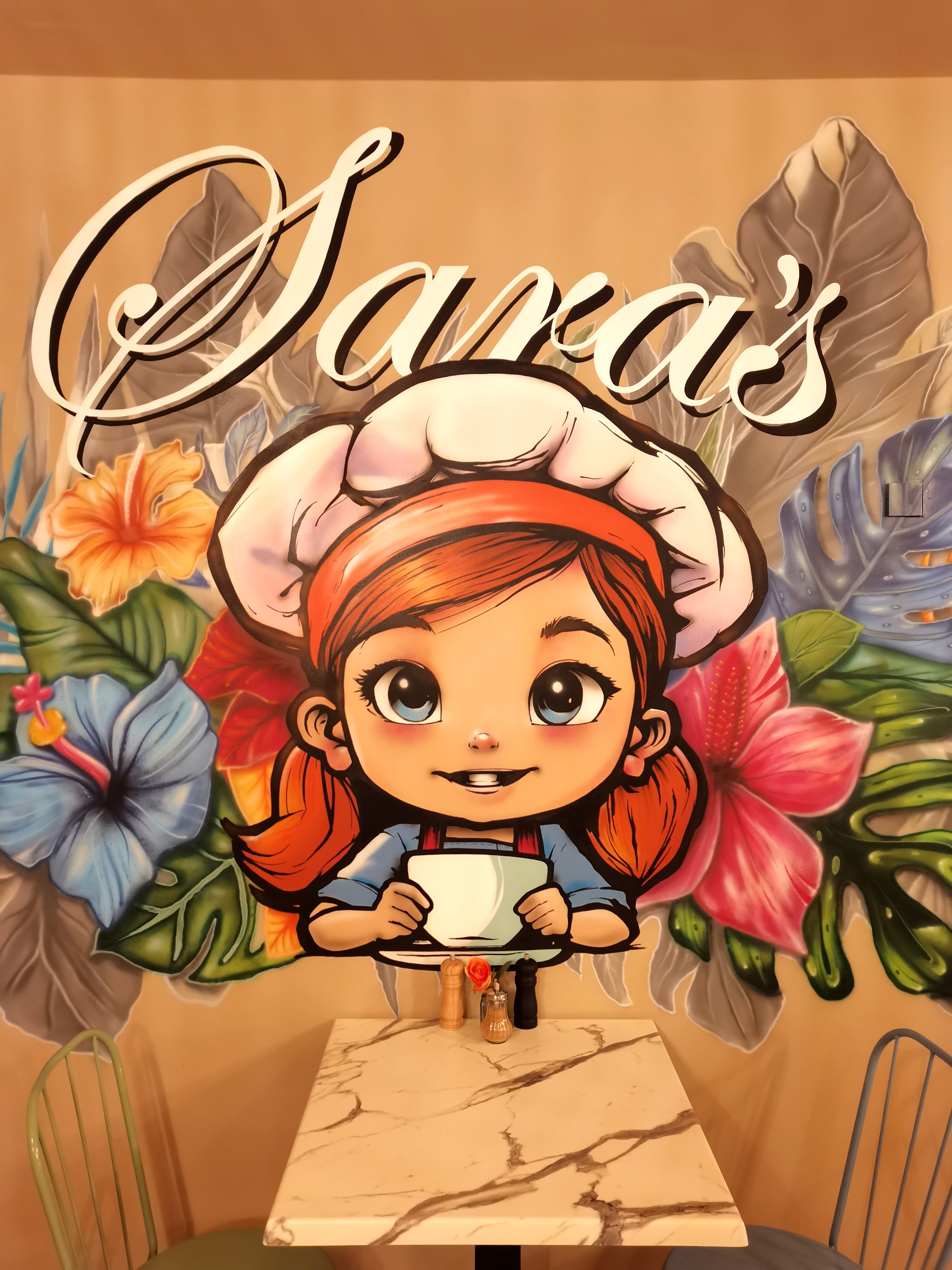 Sara's Café Sitzbereich und Wanddesign